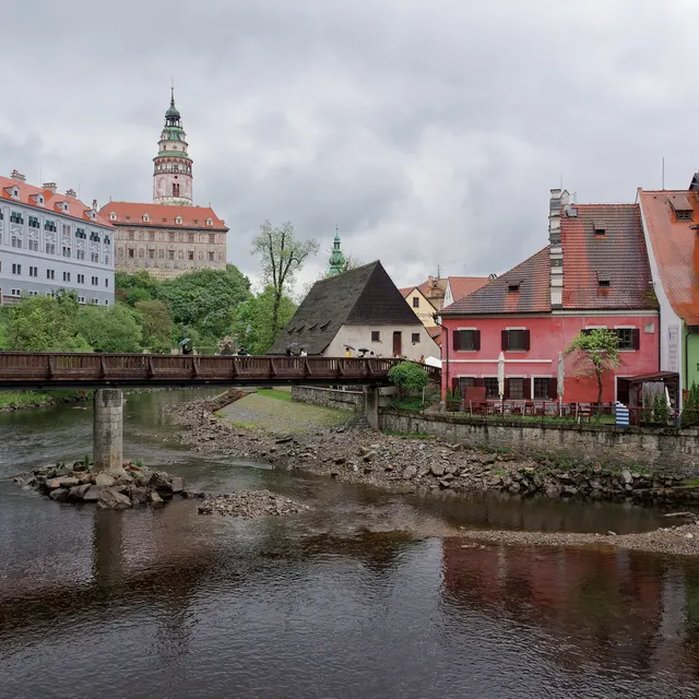 The Vltava river below Český Krumlov Castle with the castle on its rock